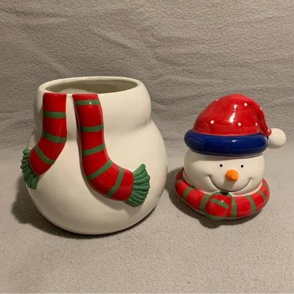 Holiday Snowman Cookie Jar with Santa’s red hat and red/green striped scarf. - Picture 7 of 8